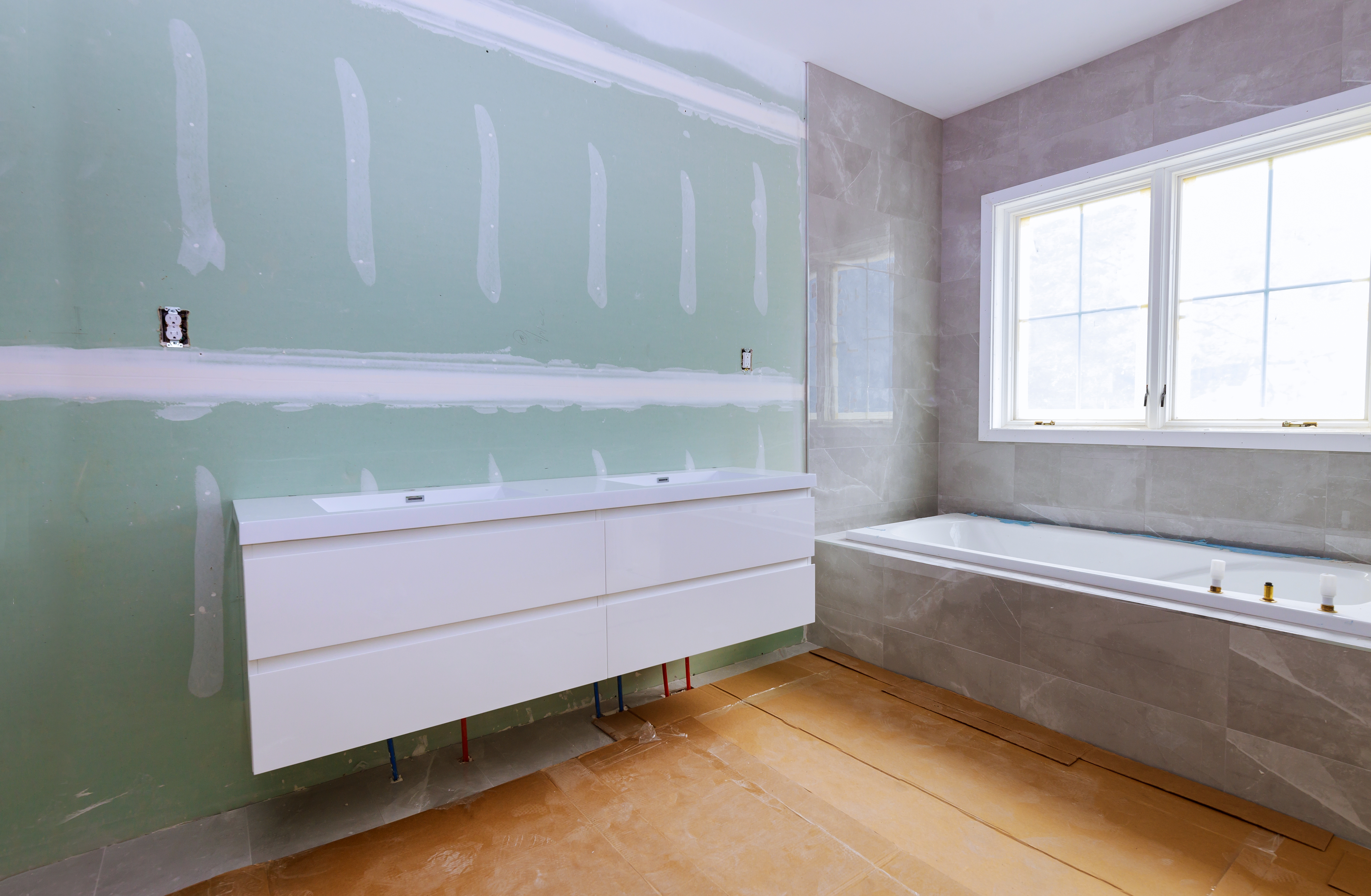 Construction details with industry renovation shower in tiled bathroom with windows molding